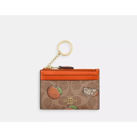NWT Coach CAR21 Mini Skinny Id Case In Signature Canvas With Orange Print In Tan - Picture 2 of 5